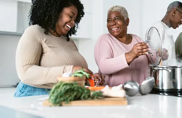 Smiling woman looking at smart watch