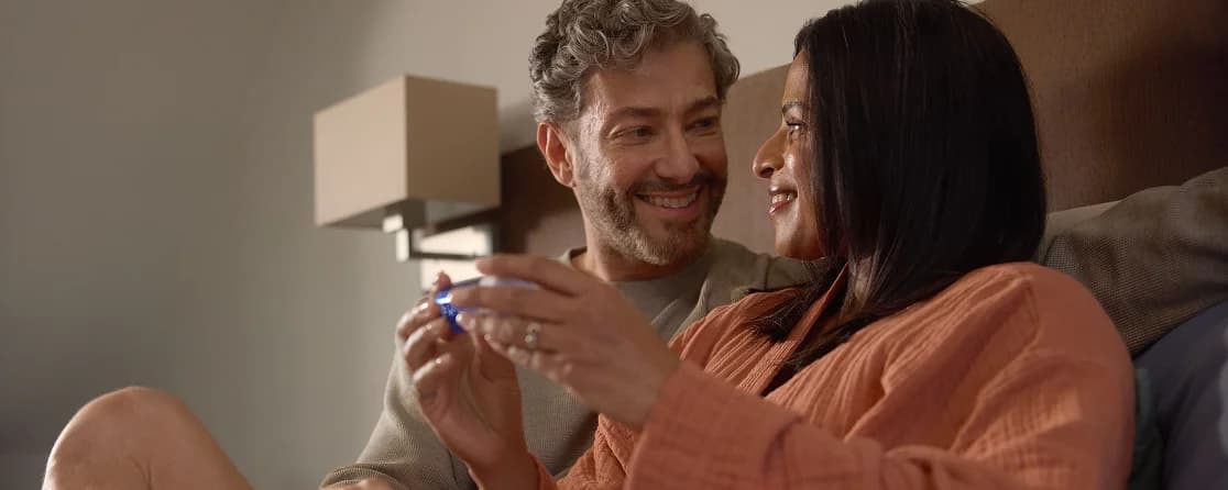 Couple at home representing sexual health care