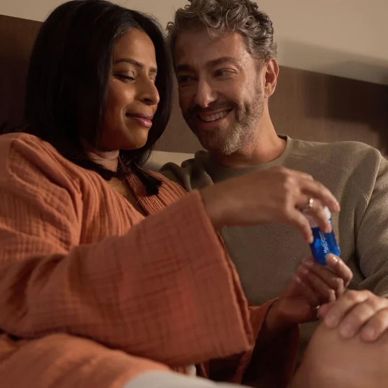 Couple relaxing together on a sofa