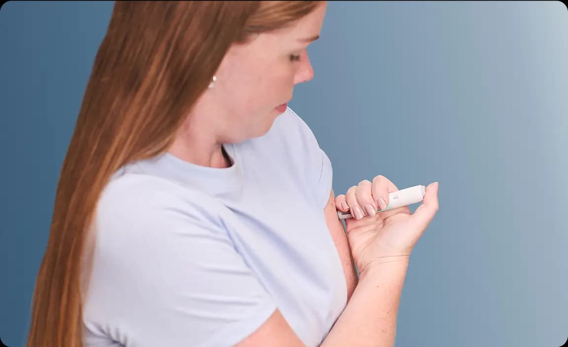Woman using injectable pen