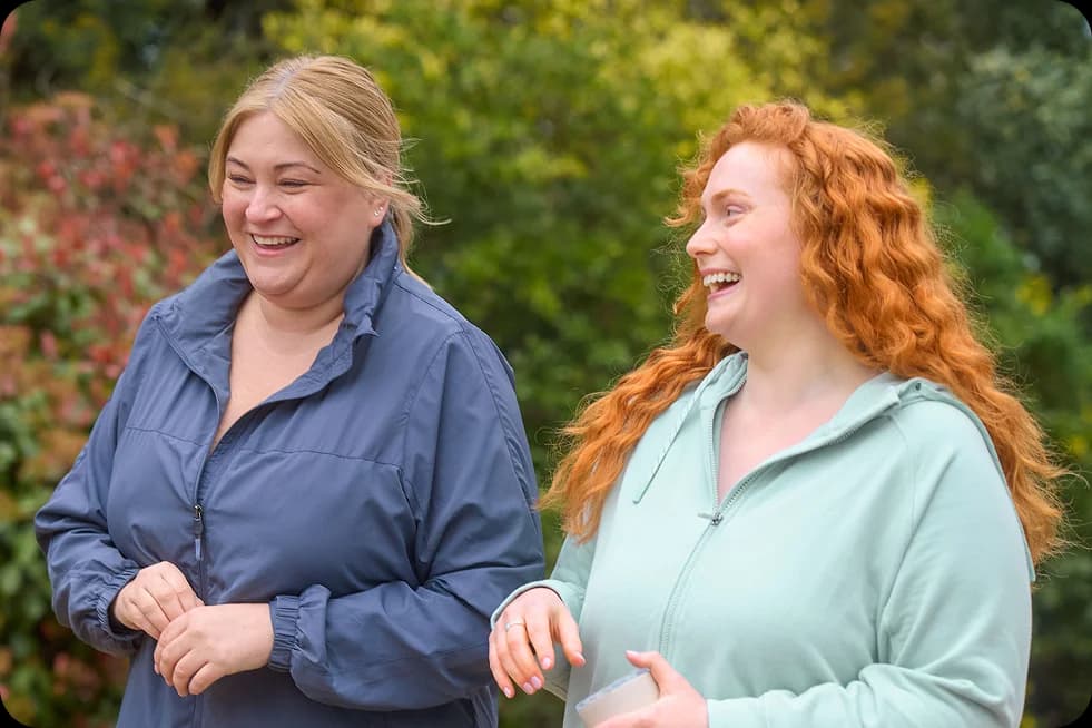 Two women sharing a laugh