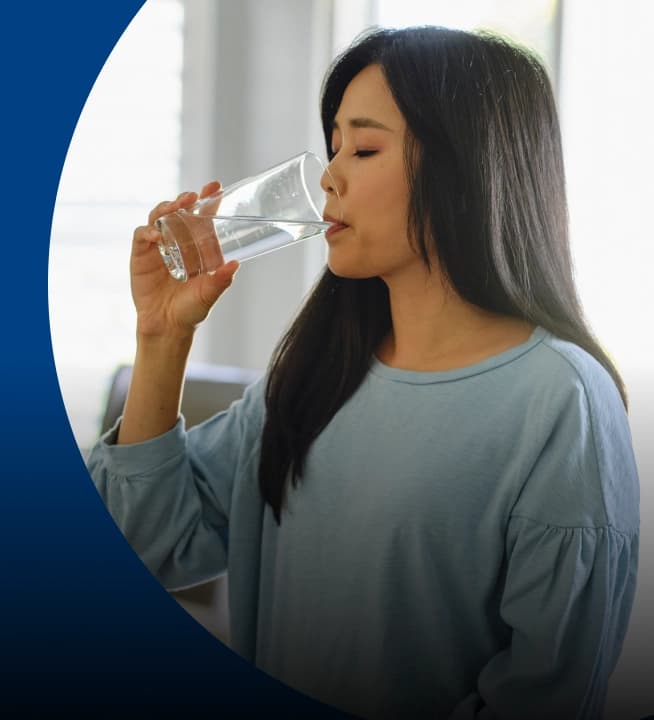 Woman drinking a glass of water