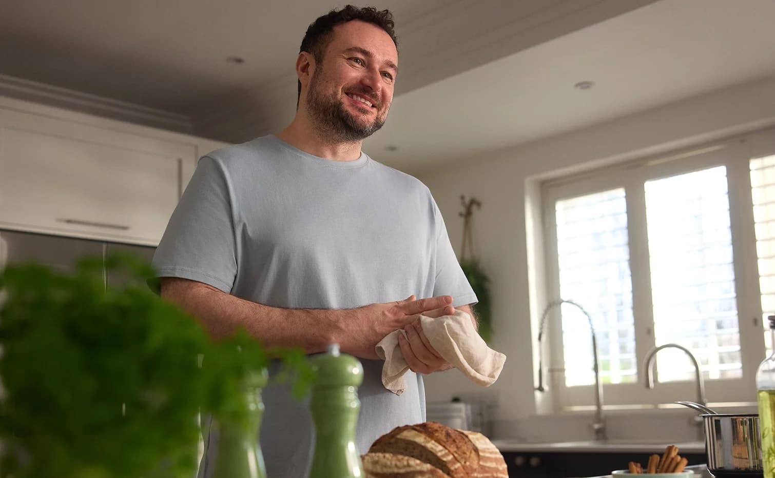 A man in his kitchen