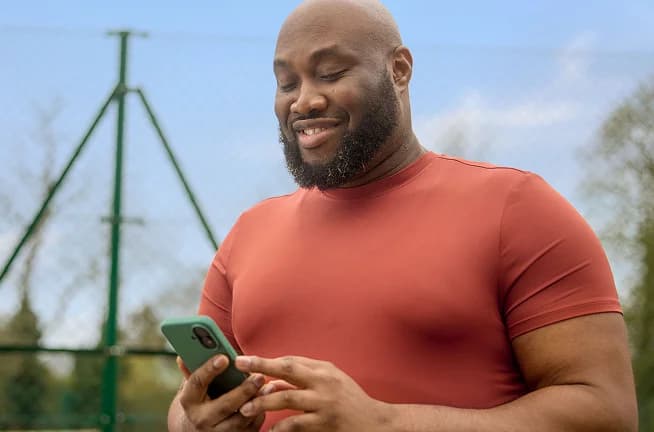 A man on his smart phone