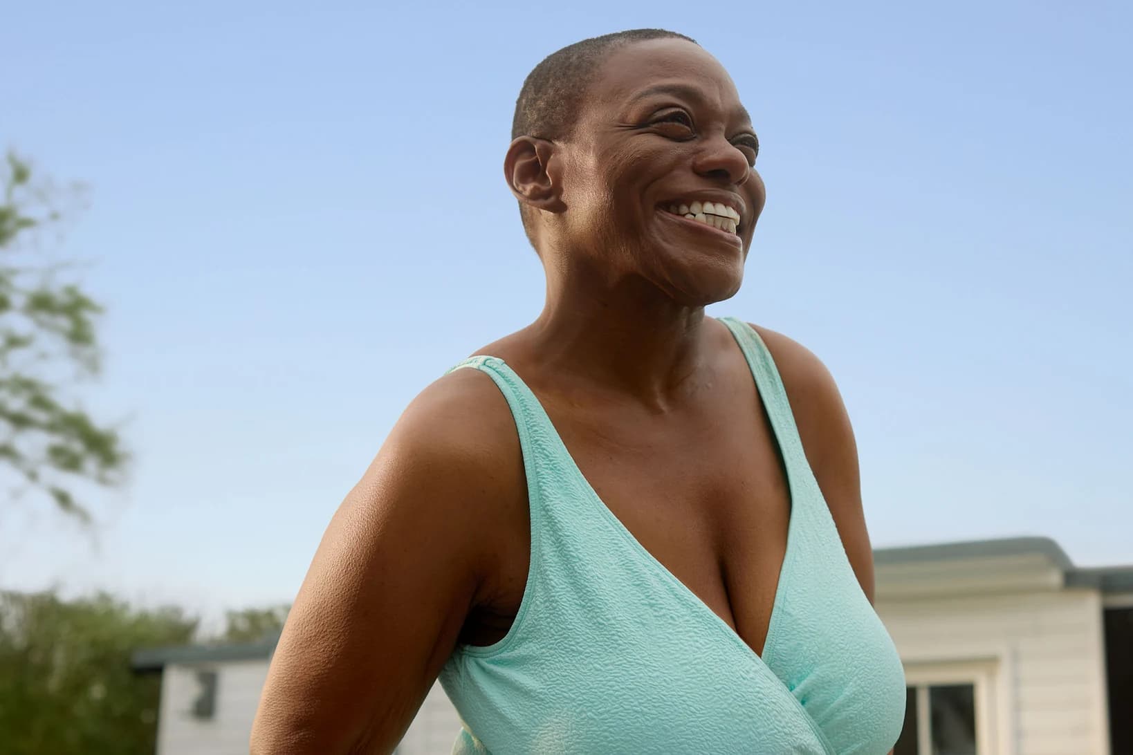 A woman smiling